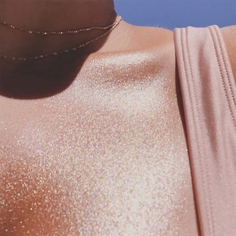 shimmering body oil for dark skin